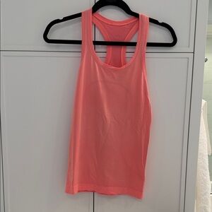 Women's lululemon swiftly tech racer back tank. Size 4 orange color.